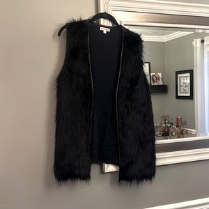 Never been worn, faux fur, navy vest, size L
